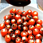 Mozzarella-Filled Cherry Tomatoes with Balsamic Glaze