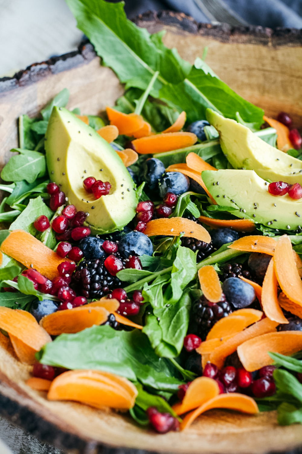 Wintery Greens with Avocado, Berries, Pistachios and Tahini Dressing 